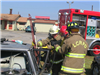 Firefighters Accessing a Car