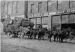 Dublin 1900 Mule drawn wagon loaded with bales of cotton in front of J D Smith Son Stable located on