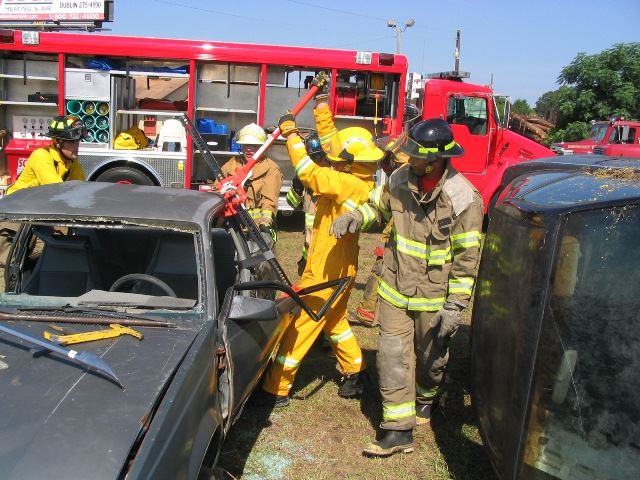Firefighters Breaking Into the Vehicle